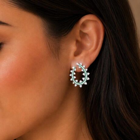 contemporary emerald and diamond hoop